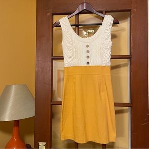 White and mustard sleeveless dress